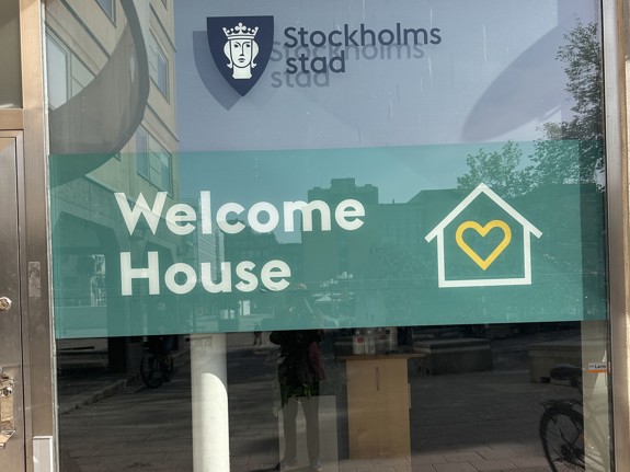 Skylt på Welcome House