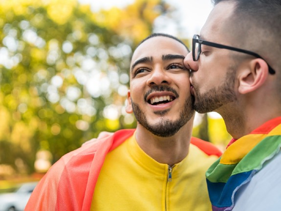 Gay couple embracing each other