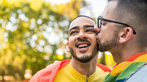 Gay couple kissing. Photo: Mostphotos
