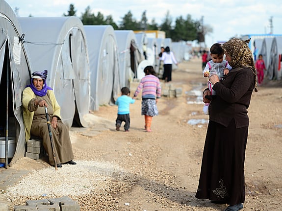 människor i ett flyktingläger. Foto: Mostphotos.